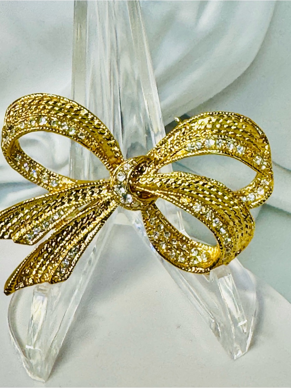 Vintage Roman Gold Bow Brooch with Clear Rhinestones